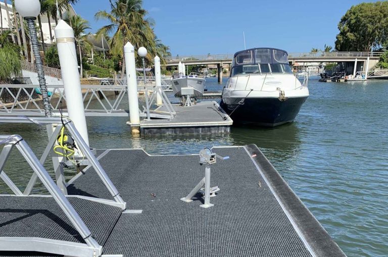 What equipment can help you dock safely when there’s strong wind or current?